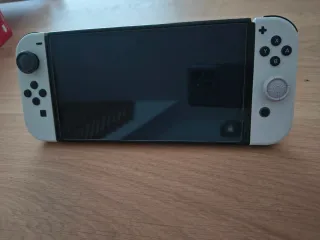 Nintendo Switch OLED bianco + 2 GIOCHI