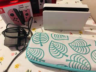 Nintendo Switch OLED + joycons rosa + custodia + dock