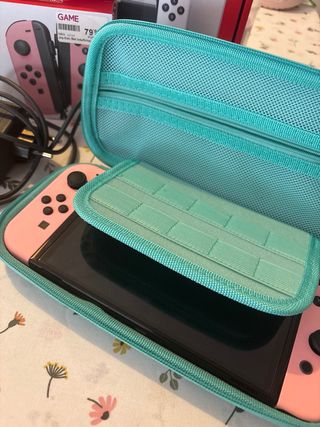 Nintendo Switch OLED + joycons rosa + custodia + dock