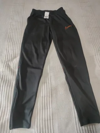 Pantalón chándal Nike gris talla S