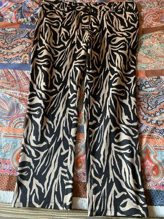 Pantaloni a fantasia zebra beige e neri