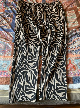 Pantaloni a fantasia zebra beige e neri
