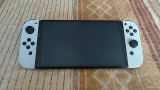 Nintendo Switch OLED bianco + controller Zelda + giochi