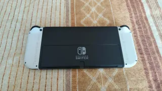 Nintendo Switch OLED bianco + controller Zelda + giochi