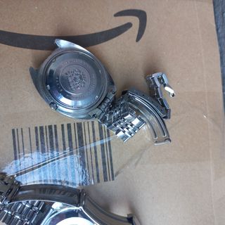 2 Relojes Sicura y orient