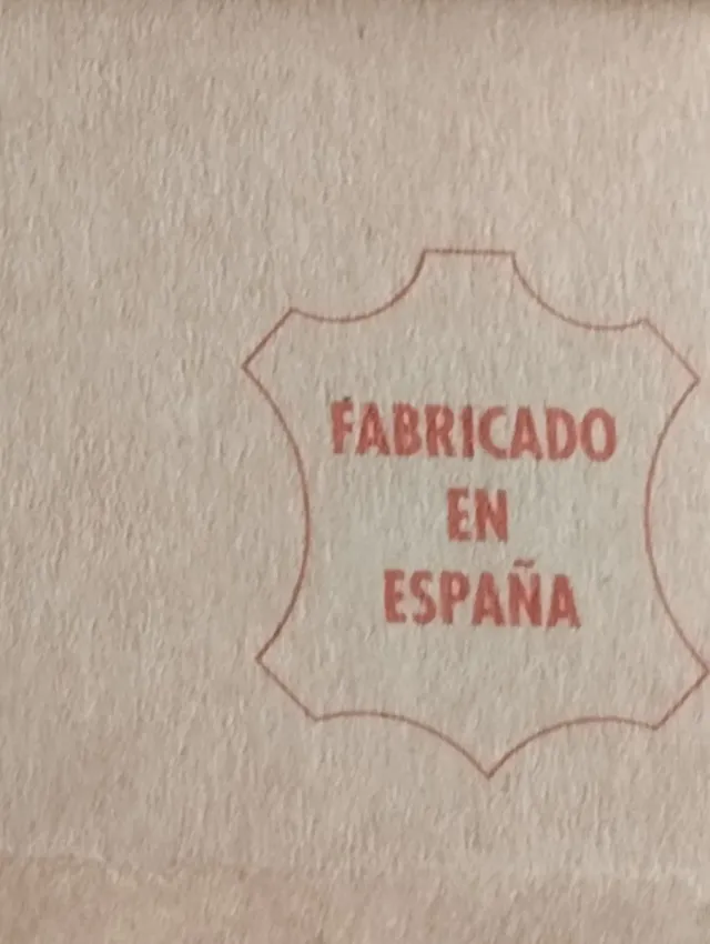 Botines cuña piel vuelta marrones.