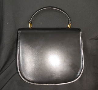 Bolso Negro Celine con Logo Dorado
