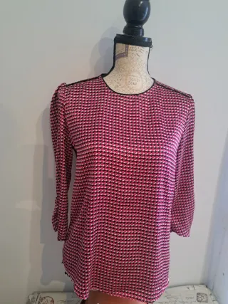 Blusa manga tres cuartos