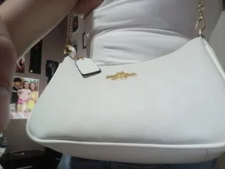 Borsa Coach bianca con tracolla e manico