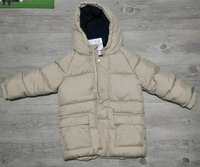 Chaqueta acolchada unisex con capucha