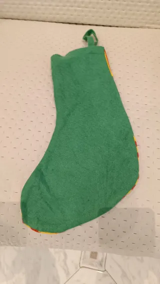 Calza Befana verde con stelle bianche