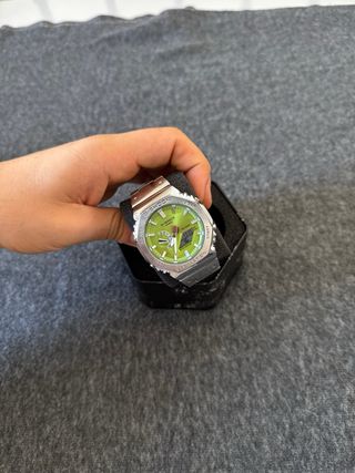 Reloj Casio de acero plateado y dial verde
