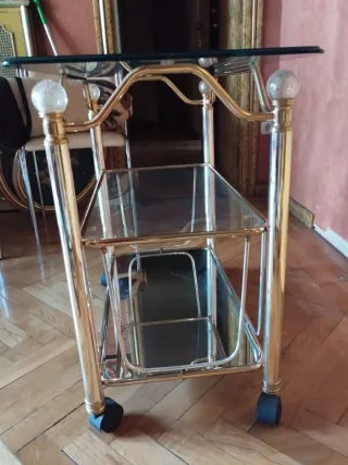 Mesa auxiliar cristal y metal con ruedas vintage