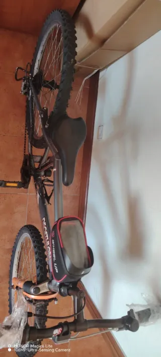 Bicicleta Decathlon Cycle naranja y negro