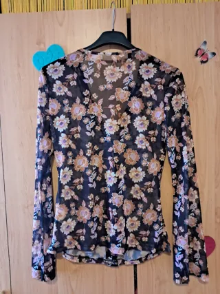 Blusa estampada floral manga larga