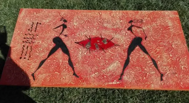 Quadro tribale con figure stilizzate