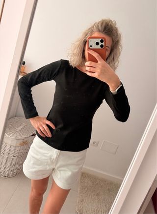 Blusa negra elegante espalda abierta