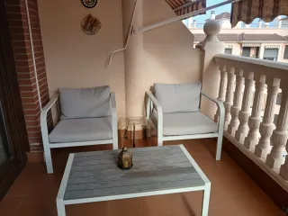 Conjunto terraza jardín metal y tela.