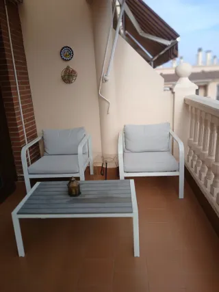 Conjunto terraza jardín metal y tela.