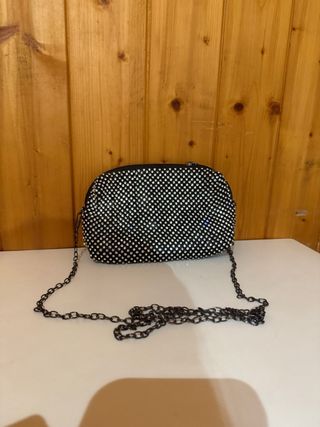 Bolso de mano con pedrería 