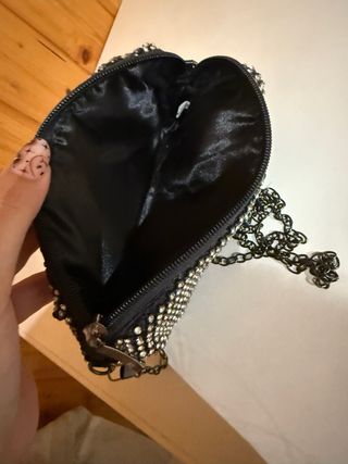 Bolso de mano con pedrería 