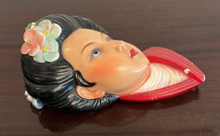 Scultura testa donna giapponese