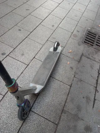 Patinete freestyle plateado