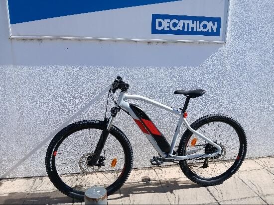 Bicicleta eléctrica MTB Rockrider E-ST 100 Blanco Rojo