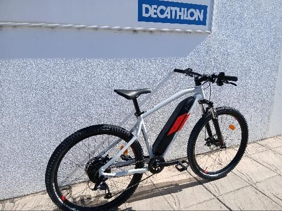 Bicicleta eléctrica MTB Rockrider E-ST 100 Blanco Rojo