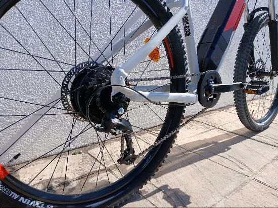 Bicicleta eléctrica MTB Rockrider E-ST 100 Blanco Rojo