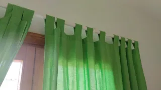Cortinas verdes 
2.20 alto 
90 ancho 
Dos piezas 