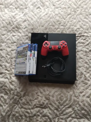 PS4 con 3 juegos y mando rojo