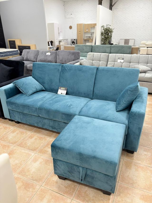 Divano letto blu con poltrona e contenitore