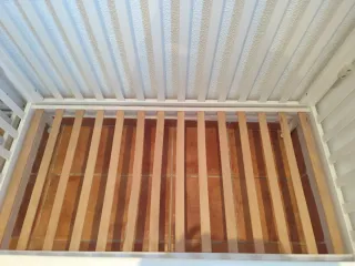 Cuna blanca de madera