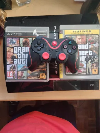 Consola PS3 con mando y juegos