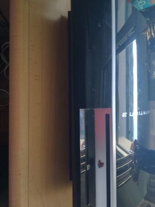 Consola PS3 con mando y juegos