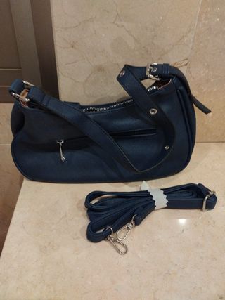Bolso azul marino con tachuelas