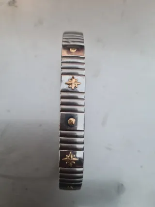 Bracciale uomo acciaio e oro