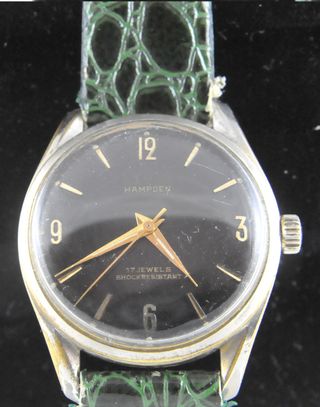 Reloj de cuerda HAMPDEN negro y dorado