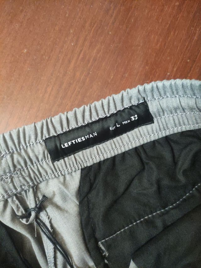 Calças de treino cinzentas novas