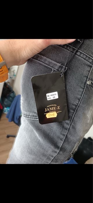 Vaqueros Philipp Plein grises con calavera amarill