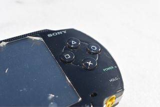 PSP 1004 Fat con caja original, cargador y funda