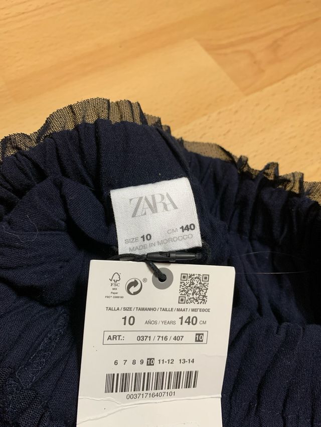 Falda ZARA corta brillante azul marino
