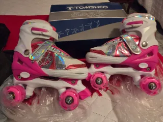 Patines infantiles rosas y blancos