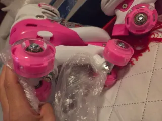 Patines infantiles rosas y blancos