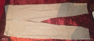 Pantalón Calzedonia cuadros beige y negro