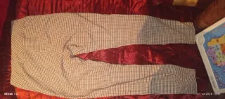 Pantalón Calzedonia cuadros beige y negro