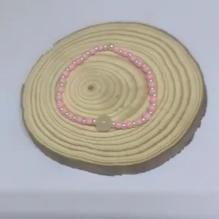 Pulsera perlas rosas y blancas con bola central