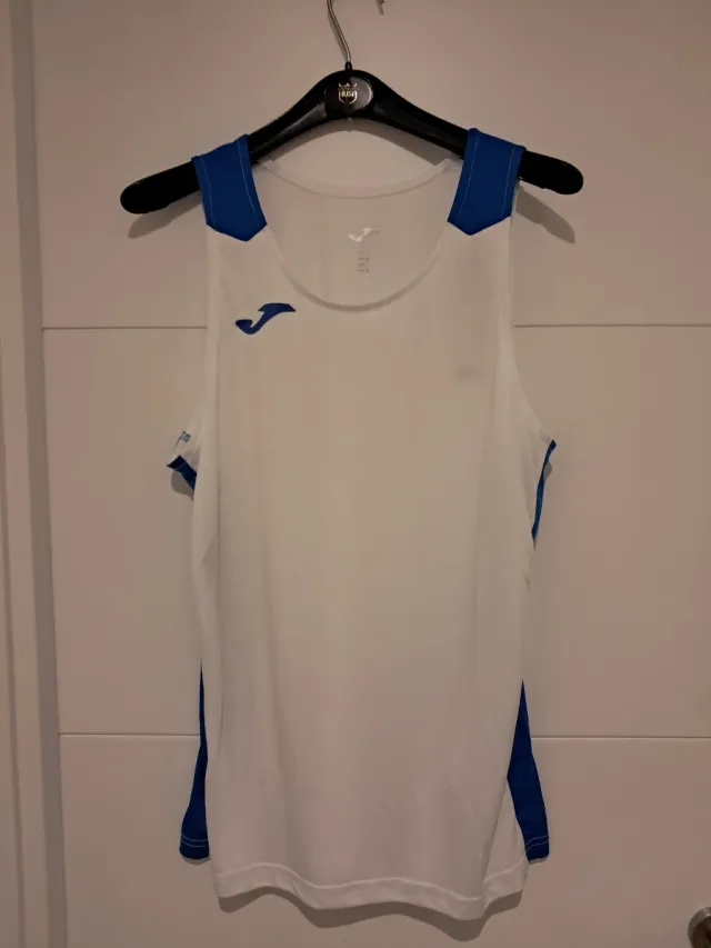 Camiseta Joma sin mangas blanca y azul