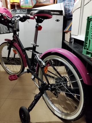 Bicicleta niña rosa con ruedines